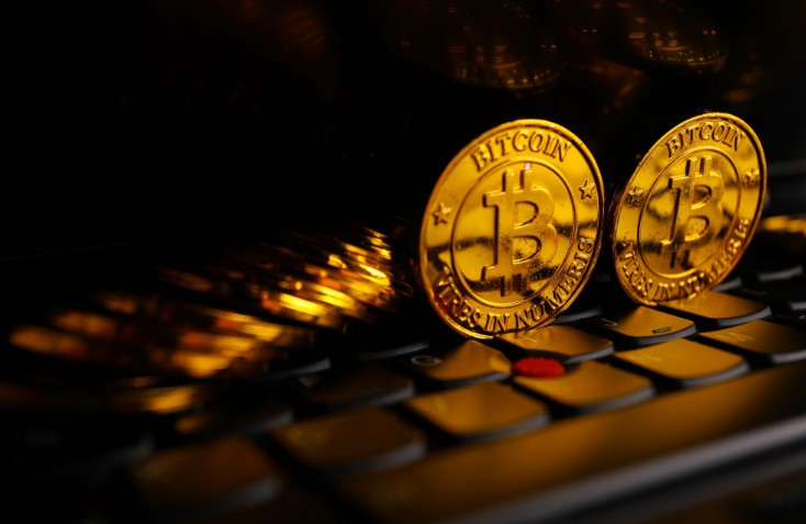 拆解ICO怪象:项目白皮书互相抄袭 投资者进群先交1万_金融_电商之家