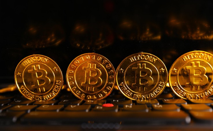 迈克菲挑战小摩CEO：比特币有价值不是骗局_金融_电商之家