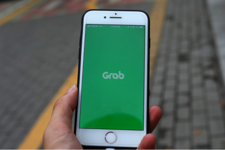 传网约车公司Grab要求在与Gojek合并后获得更多控制权_O2O_电商之家